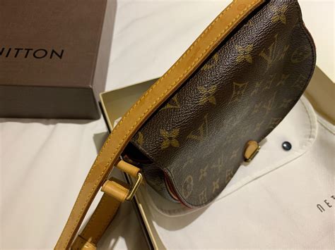 Louis Vuitton Sling Bag .